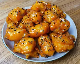 Frittelle di maiale in salsa agrodolce